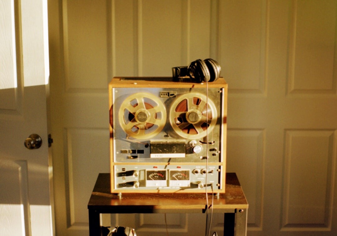 Analogue film editing bench with reels and a splicer