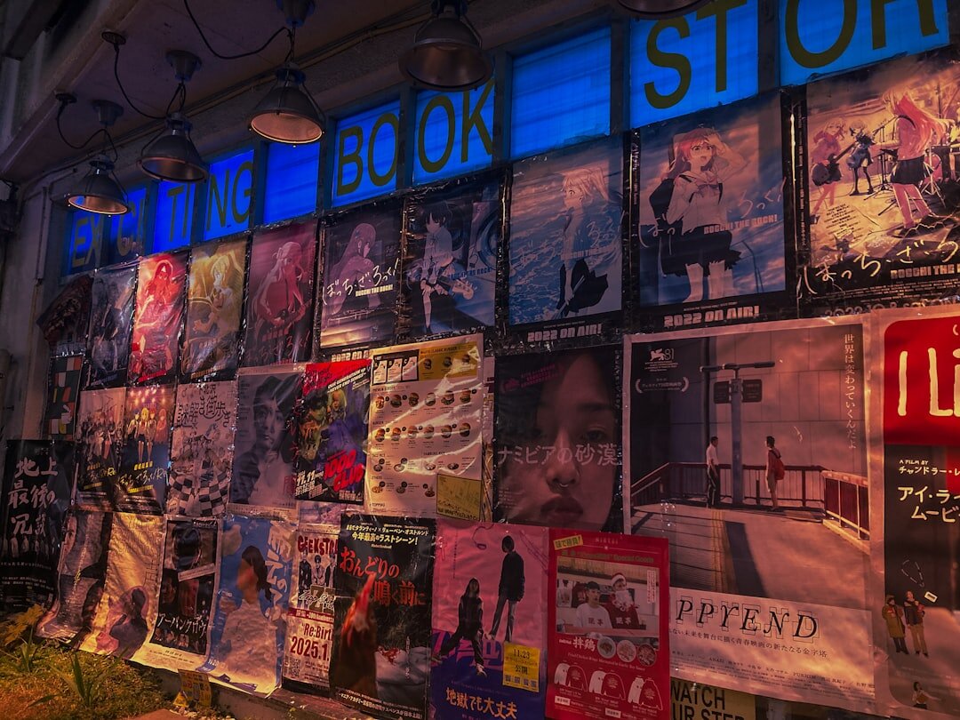 Wall covered with colourful vintage advertising posters